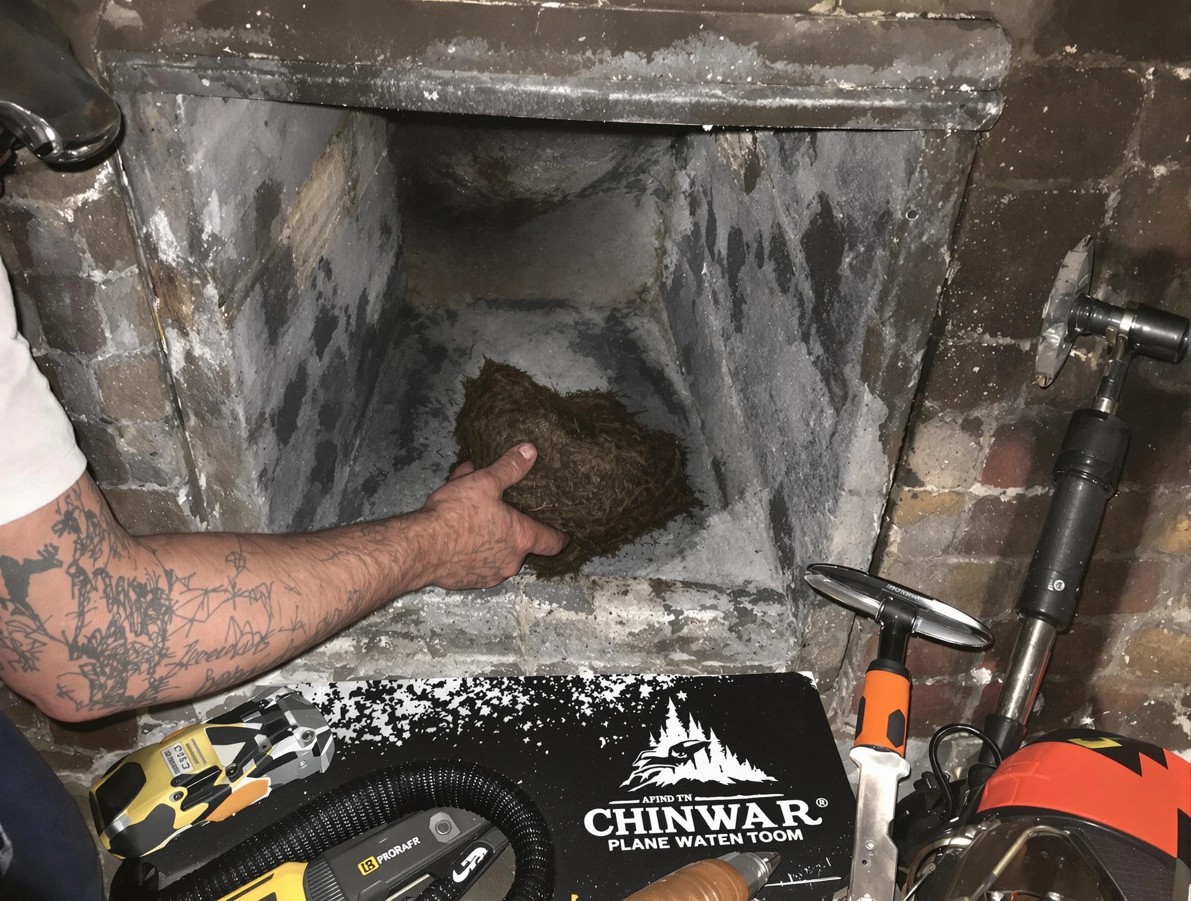 Little Egg Harbor Chimney Sweep safely removing debris and screening chimney in Little Egg Harbor, NJ